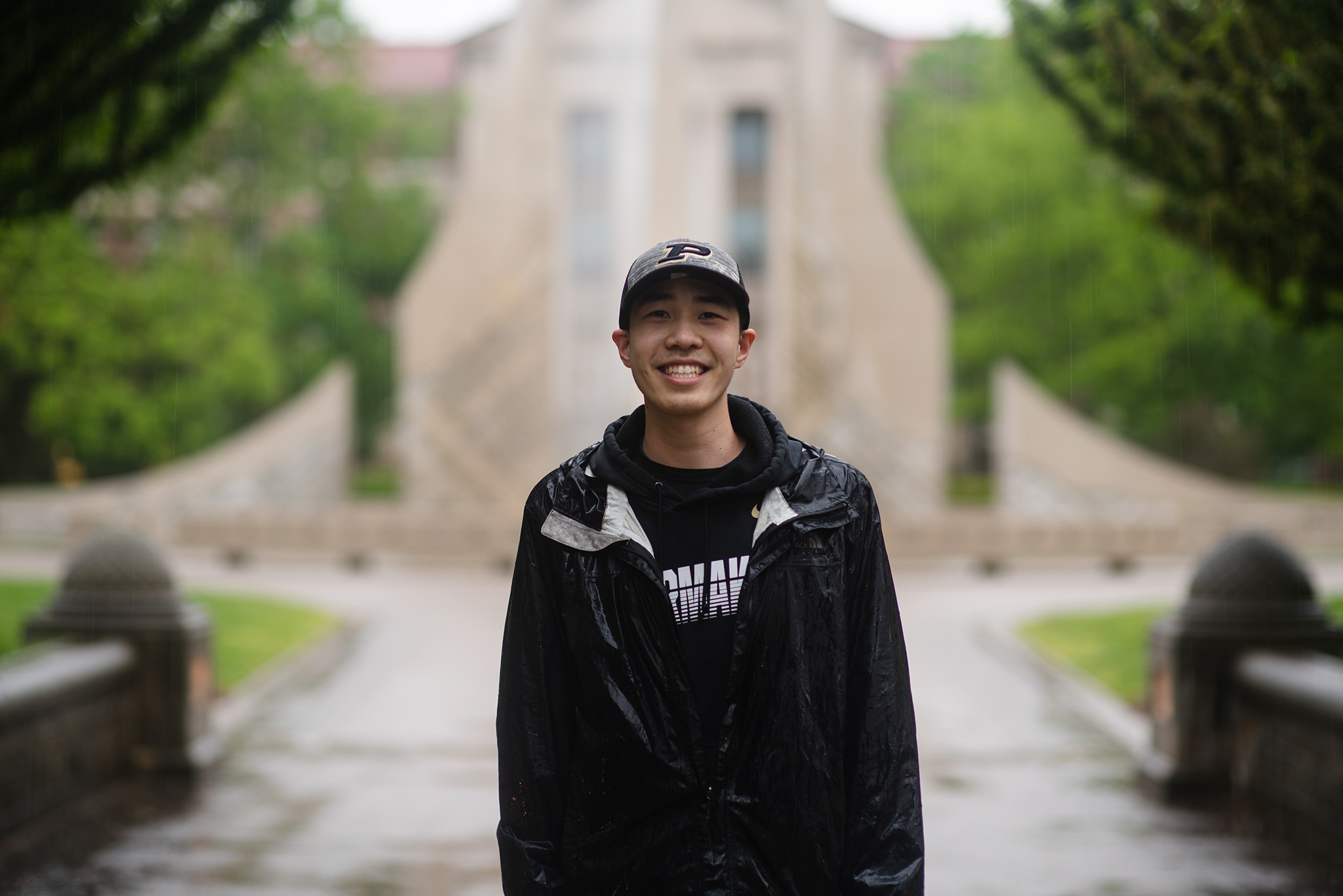 A photo of Nathaniel Young at Purdue University in front of the Engineering Fountain.